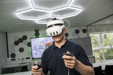 A VR headset helps construction learners explore CAD plans