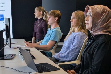 The new simulator will sit alongside the University's Data Immersion Suite, where these Lancaster students are pictured