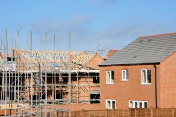 House Under Construction At Building Site