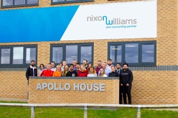 nixon-williams-employees-outside-their-new-office-on-whitehills-business-park.jpg