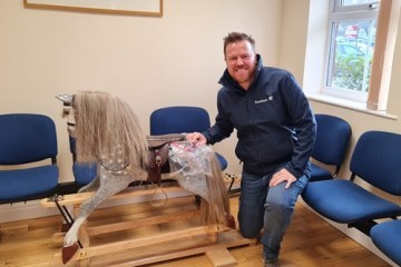 Stuart Buchanan Of Sundown Solutions Collecting His Rocking Horse From Age Concern Central Lancashire