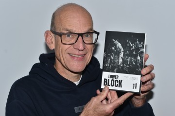 Clive Lawrence with the book