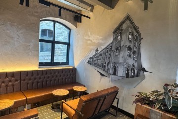 The modern art installed in Black Sheep Coffee Northlight features views of the buildings surrounding it.JPG.jpg