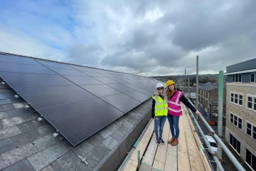 Image caption (L-R) Viki Thomas, Financial Controller, and Hayley Duckworth, Head of People, oversee the solar panel installation at Marsden Building Society’s Principal Office .jpg.jpg