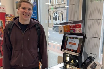 Matt Zeunert checking out the self checkouts landscape.jpg.jpg