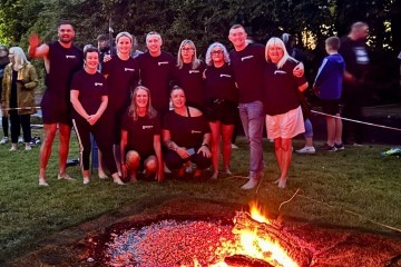 Ryan White (left) and the team from Find Your Way Fitness at Rainbow Hub Fire Walk 2025.jpg.jpg