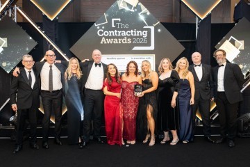The Team At Ics Celebrating Their Win
