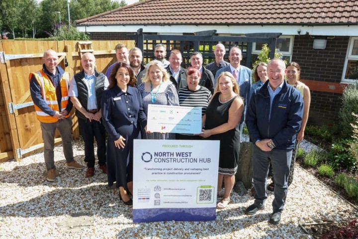 Members of the North West Construction Hub with Neil Conlon (far right) officially hand over the beautiful new SAFE Centre garden to centre staff and trust executives 