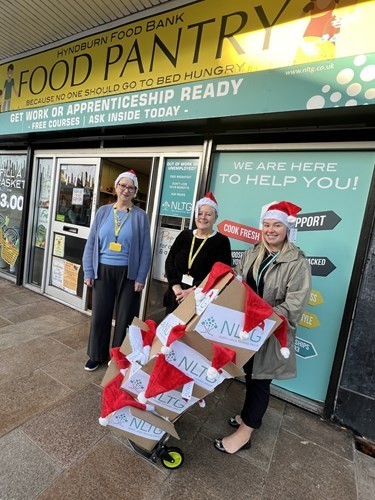 Nltg Donate Santa Hats To Hyndburn Food Pantry 2