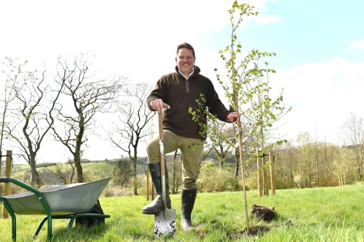 Graham Gordon MHA Moore And Smalley plants a tree