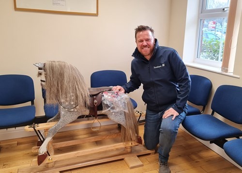 Stuart Buchanan Of Sundown Solutions Collecting His Rocking Horse From Age Concern Central Lancashire