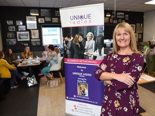 suzy-orr-founder-unique-ladies-networking-with-banner.jpg