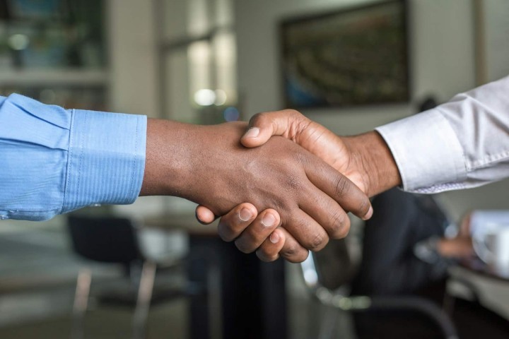 two people shaking hands.jpg.jpg