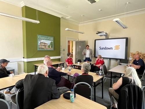 heath-groves-ceo-of-sundown-solutions-speaking-at-an-armed-forces-veterans-event-hosted-by-community-solutions-north-west.jpg