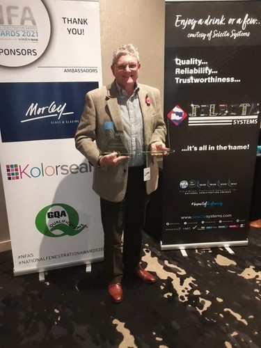 roy-barker-of-nltg-with-both-the-2020-and-2021-awards-for-training-company-of-the-year-at-the-national-fenestration-awards.jpg
