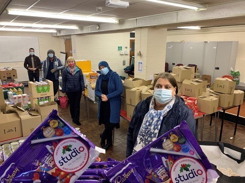 syd-soge-manager-at-the-arc-project-blackburn-with-the-donations.jpg