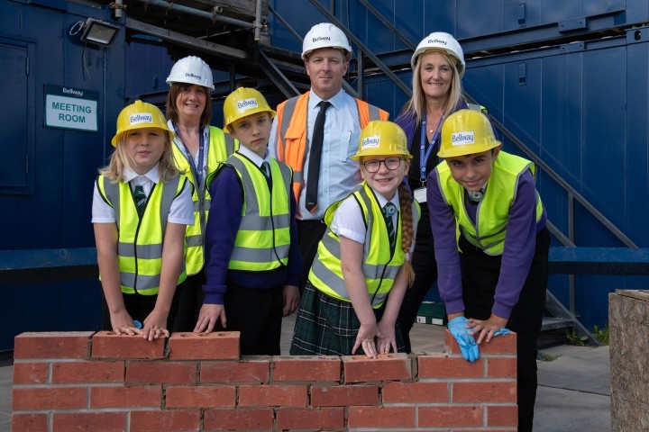 Bellway's site manager John Campbell with Brookfield Park Primary pupils at Lathom Pastures.jpg.jpg