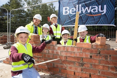 lathom-park-primary-pupils-with-assistant-site-manager-anthony-doyle-small.jpg