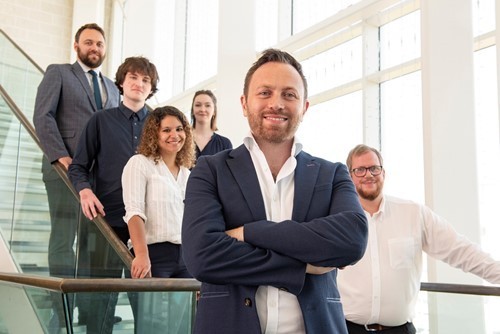 aaron-crewe-and-members-of-novi-team-at-lancaster-offices.jpg