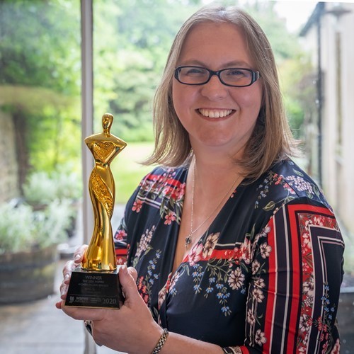 jennifer-grabowski-managing-partner-at-oglethorpe-sturton-gillibrand-with-her-women-in-law-award.jpg