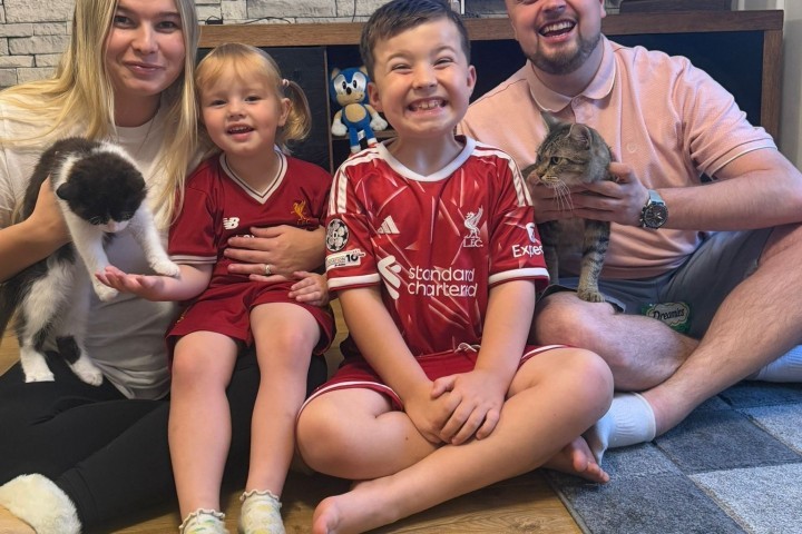 Jack Millin is pictured with his family – including the rescues they adopted, Betty and Buu.jpg.jpg
