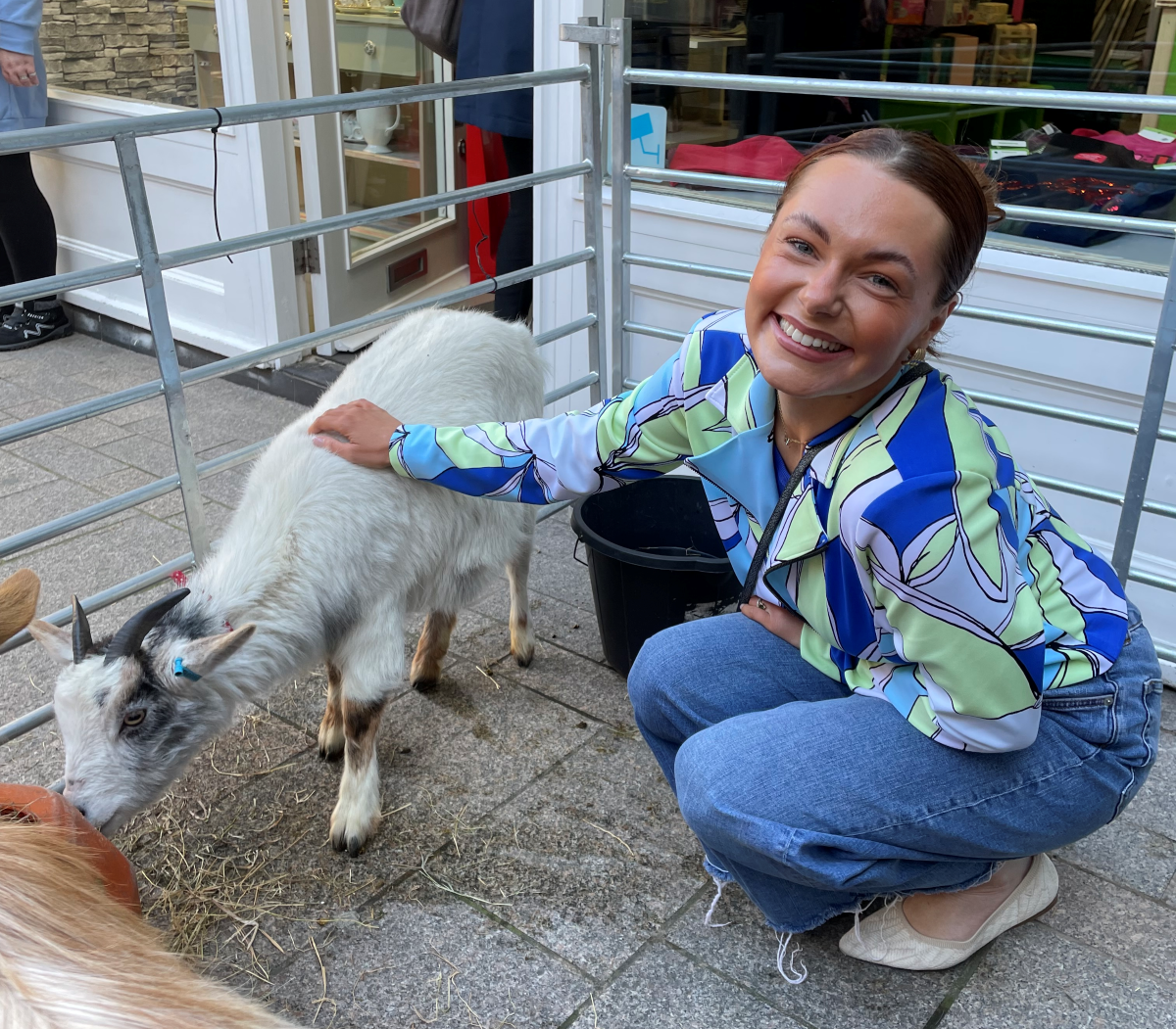 Robyn Elphick is pictured with Elsa the goat during an animal encounter at the official launch.png.png